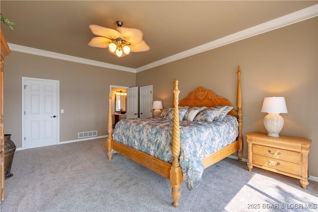 bedroom featuring crown molding, carpet flooring, ceiling fan, and ensuite bath