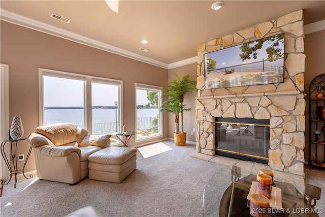 carpeted living room featuring ornamental molding and a fireplace