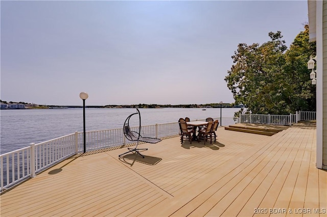 deck featuring a water view