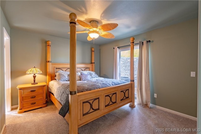 bedroom featuring light colored carpet and ceiling fan