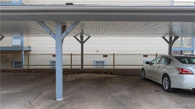 view of parking with a carport