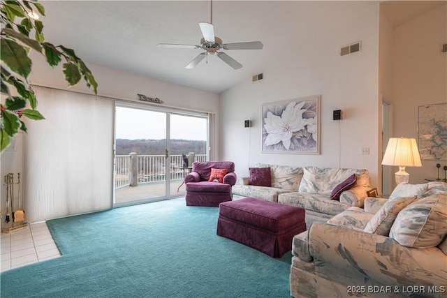 living room featuring ceiling fan, carpet flooring, and high vaulted ceiling