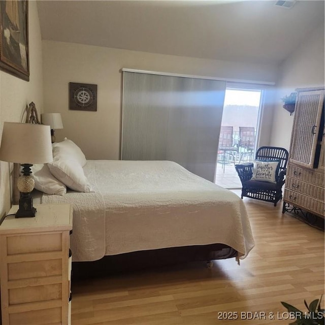 bedroom featuring light wood-type flooring