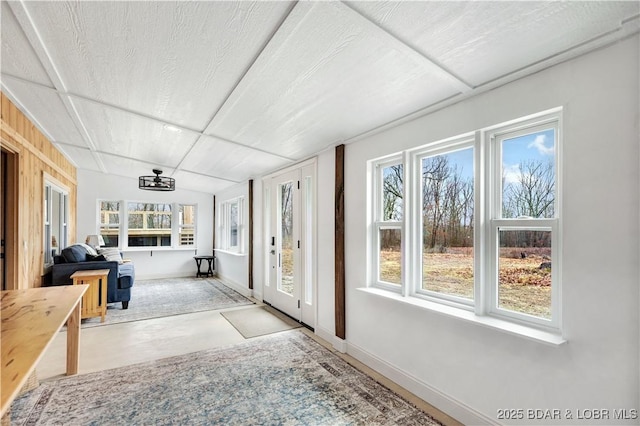 unfurnished sunroom with a wealth of natural light