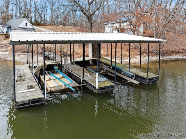 view of dock with a water view