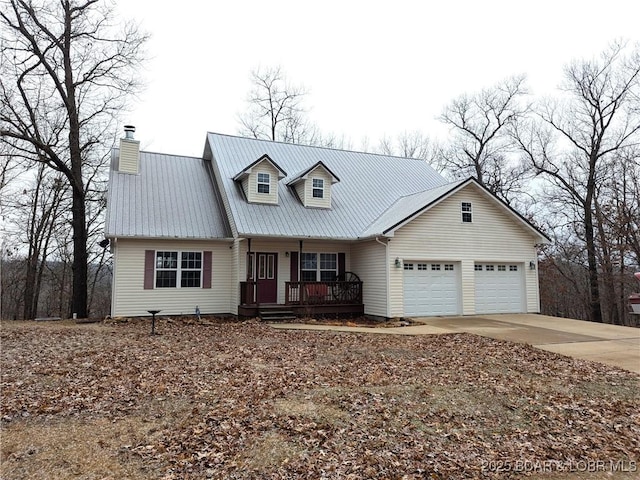 new england style home featuring a garage