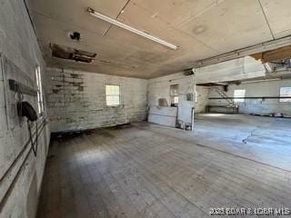 basement with wood-type flooring