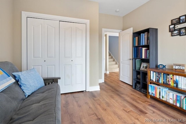 sitting room featuring hardwood / wood-style floors