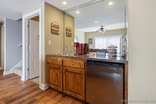 kitchen with sink, hardwood / wood-style flooring, dishwasher, and ceiling fan