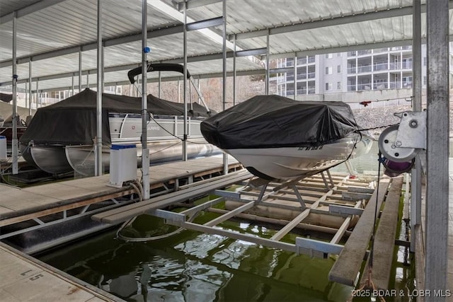 view of dock with a water view