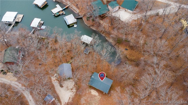 bird's eye view with a water view