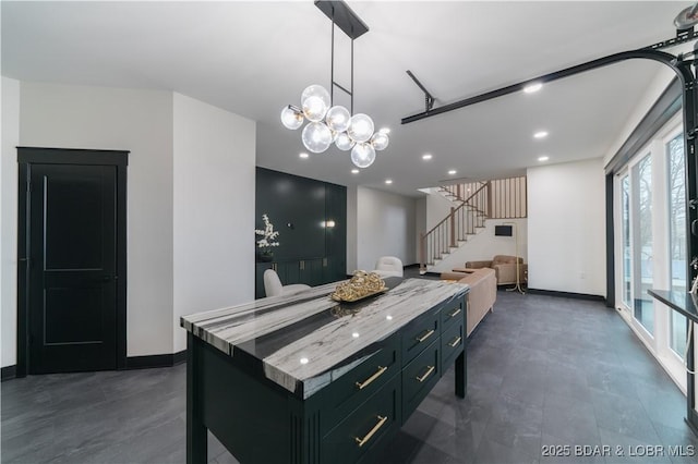 kitchen with hanging light fixtures and a center island