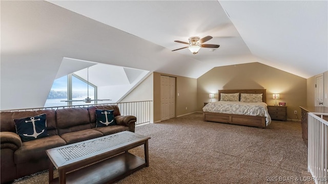 carpeted bedroom featuring a water view, ceiling fan, and vaulted ceiling