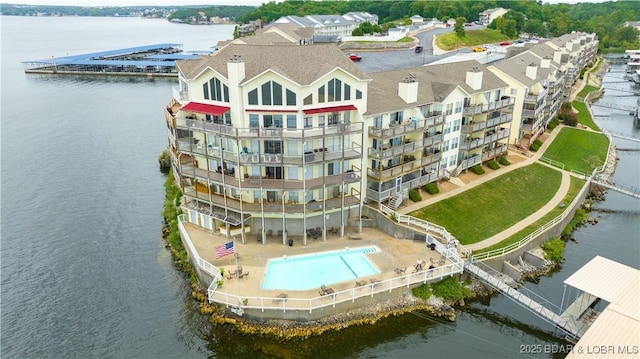 drone / aerial view featuring a water view