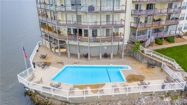 view of swimming pool with a water view