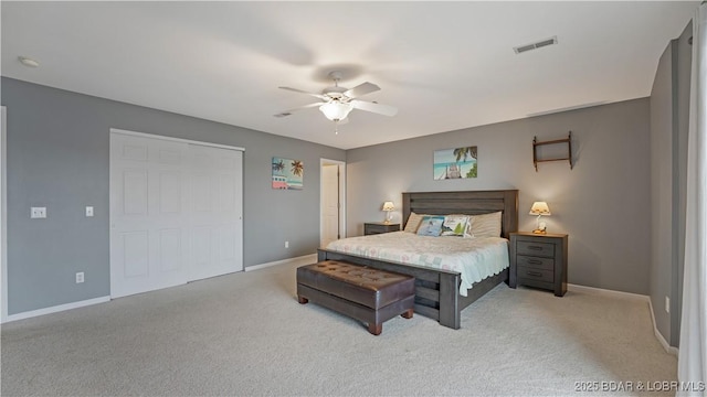 bedroom featuring ceiling fan and light colored carpet