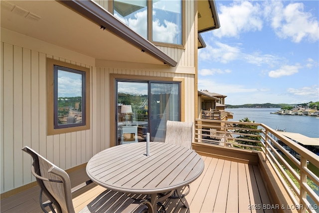 balcony featuring a water view