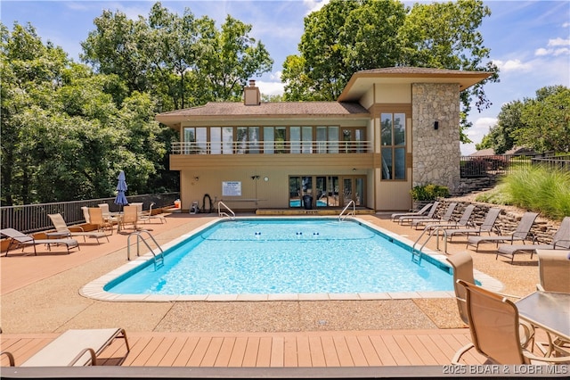 view of pool featuring a patio