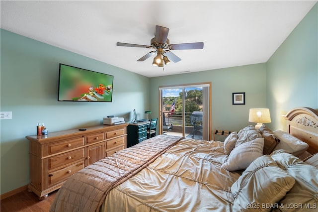 bedroom featuring hardwood / wood-style flooring, access to exterior, and ceiling fan