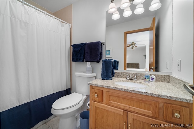 bathroom with vanity, tile patterned floors, ceiling fan, and toilet