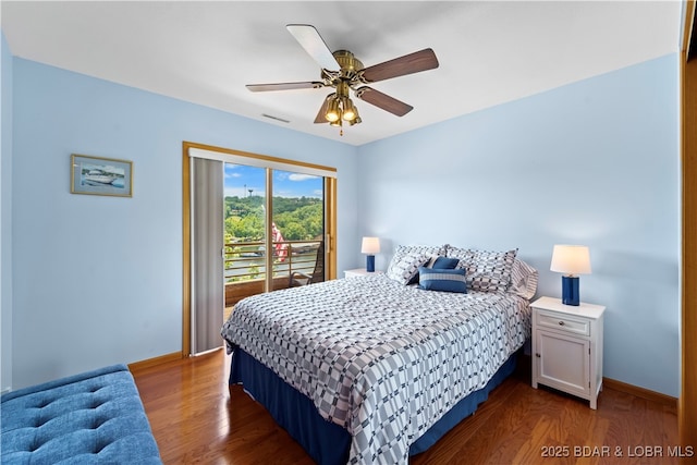 bedroom featuring access to exterior, dark wood-type flooring, and ceiling fan