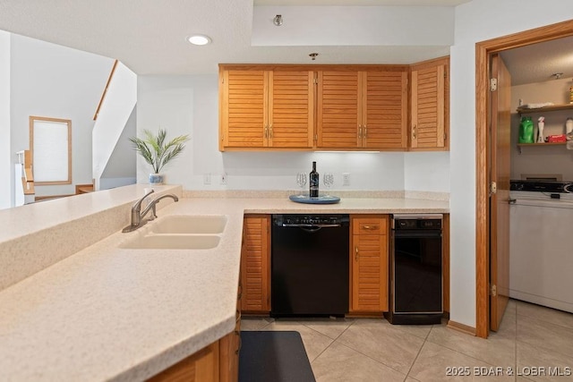 kitchen featuring black dishwasher, a sink, light tile patterned floors, light countertops, and recessed lighting