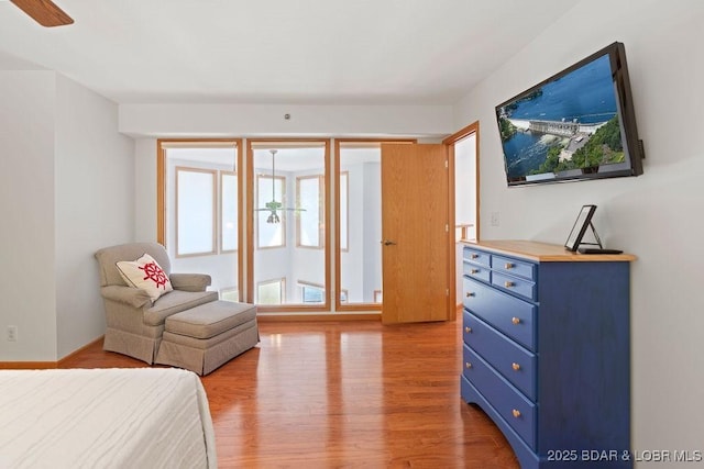 bedroom featuring light wood-style flooring