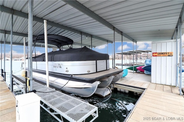 dock area featuring a water view