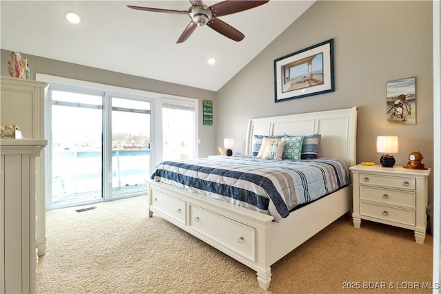 bedroom with vaulted ceiling, access to outside, light colored carpet, and ceiling fan