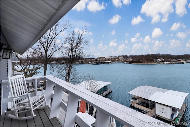 dock area with a water view