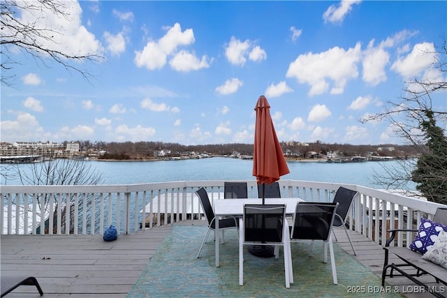 deck featuring a water view