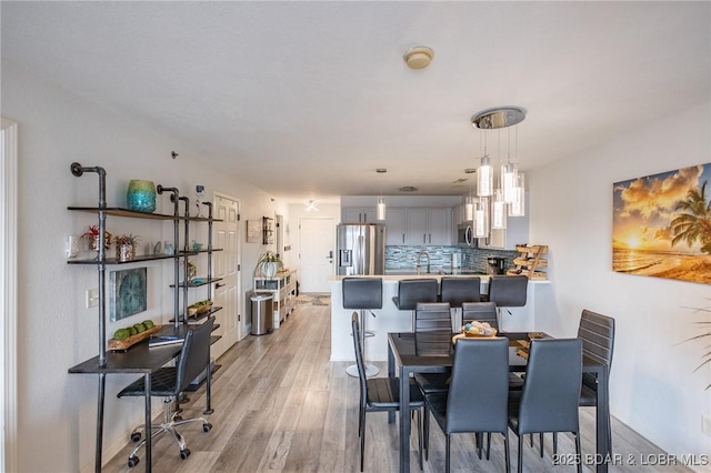 dining area featuring light hardwood / wood-style flooring