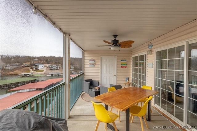 balcony featuring ceiling fan