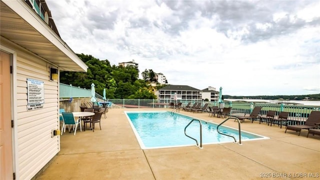 view of swimming pool featuring a patio