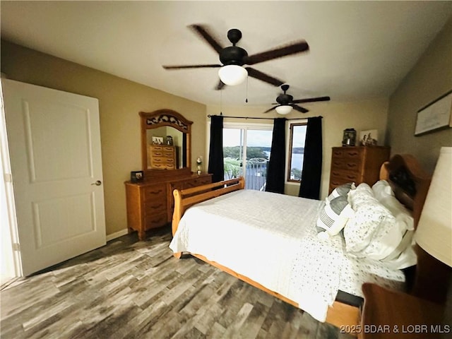 bedroom featuring ceiling fan and hardwood / wood-style floors