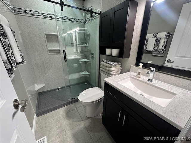 33 Crow Ct Unit 2E, Lake Ozark, MO 65049 - bathroom with vanity, a shower stall, and tile patterned flooring