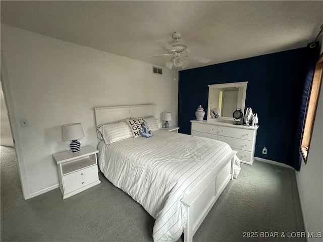 33 Crow Ct Unit 2E, Lake Ozark, MO 65049 - carpeted bedroom featuring baseboards and a ceiling fan