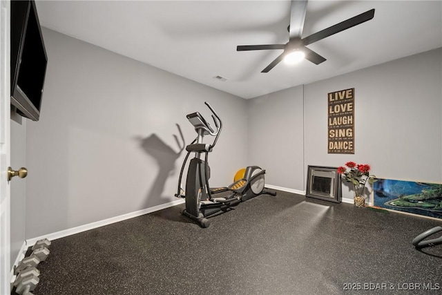 workout room featuring ceiling fan