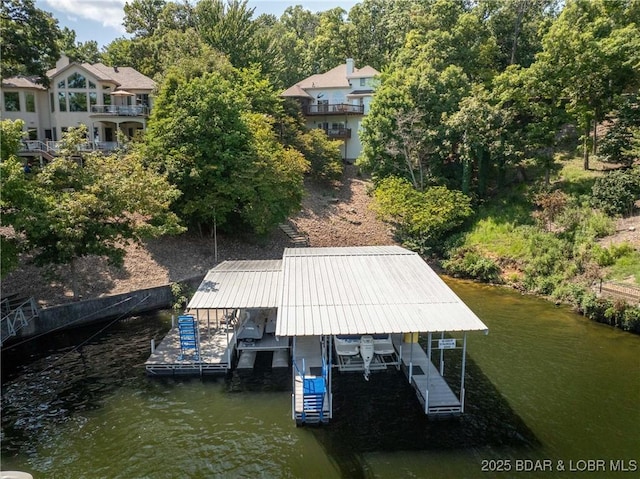 dock area with a water view