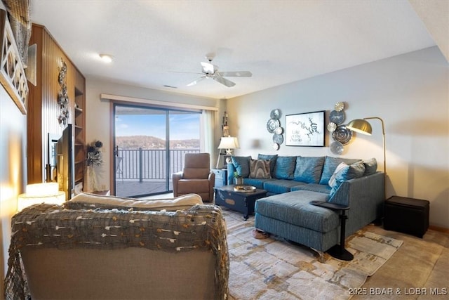 living room with ceiling fan