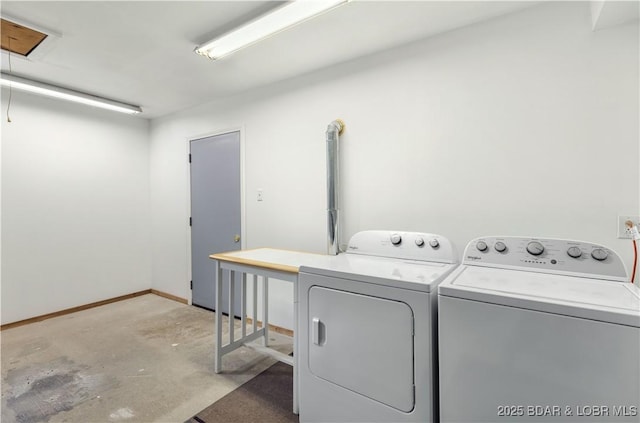 washroom with independent washer and dryer