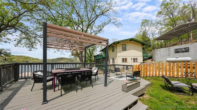 deck with outdoor lounge area and a pergola