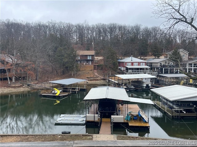 view of dock featuring a water view and boat lift