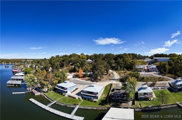 drone / aerial view featuring a water view