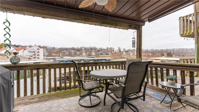 wooden terrace with ceiling fan