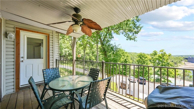 exterior space featuring grilling area and ceiling fan