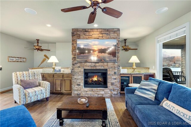 27112 White Horse Cir, Rocky Mount, MO 65072 - living room featuring ceiling fan, wood finished floors, and recessed lighting
