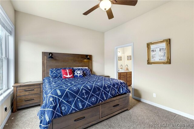 27112 White Horse Cir, Rocky Mount, MO 65072 - bedroom with carpet floors, baseboards, ensuite bathroom, and ceiling fan