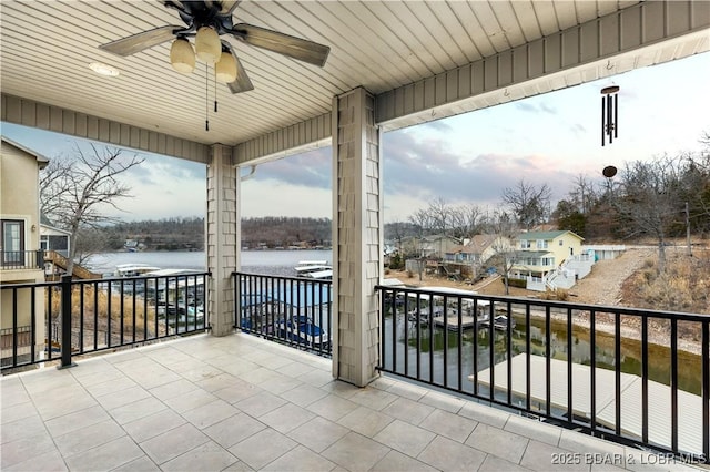 27112 White Horse Cir, Rocky Mount, MO 65072 - balcony with ceiling fan and a residential view