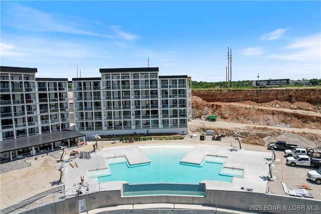 pool with a patio area